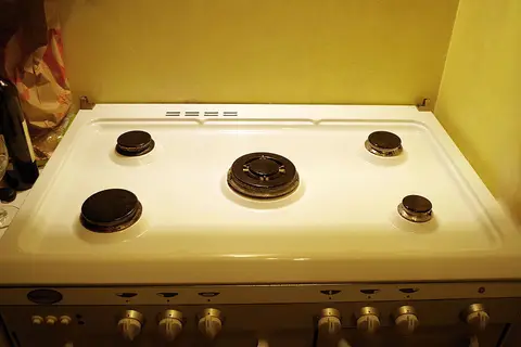 Cuisinière 4 feux Whirlpool four électrique